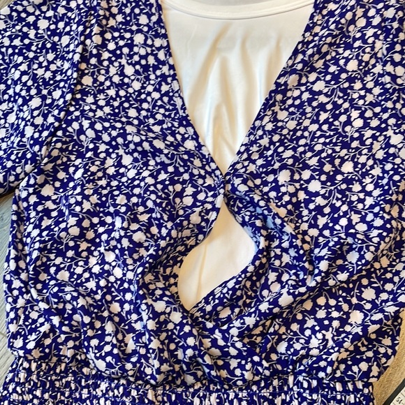 Faux wrap top with a snap closure & smocked at the  waist. - Picture 4 of 7